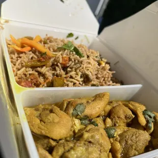 chicken and rice in a take out box