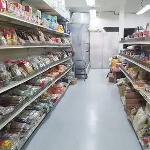 a wide aisle of food items