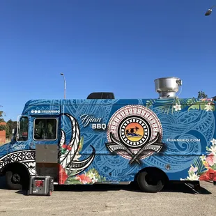 a food truck parked in a parking lot