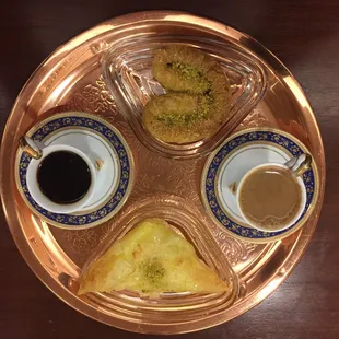 Two Swedish coffees, a Greek cheese pie and a lady heart pastry.