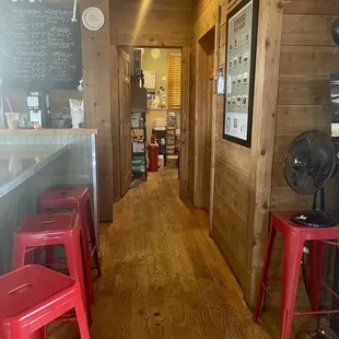 Partial coffee bar seating and hall way to the back office