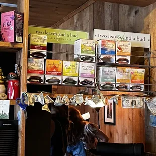 shelves of coffee, tea, and other beverages