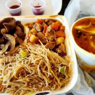 My 2-combo items included (white tray: Bistek aka "beef steak", pork menudo, &amp; side of pansit). Additional order of medium Kare Kare.
