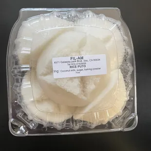 a cupcake in a plastic container