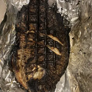 Burned grilled fish.