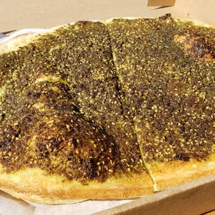 Zaatar pie ($7), vegan by default. Large and really fresh &amp; tasty. Excellent spices, excellent chew on bread.
