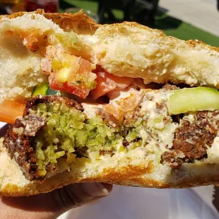 Interior of falafel sandwich w/Turkish bread ($10), vegan by default. Bread was tasty but overwhelming. Falafel was middling.