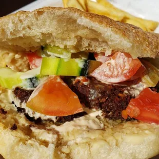 Falafel sandwich w/Turkish bread ($9), vegan by default. Bread was tasty, but overwhelming. Falafel was unmemorable.