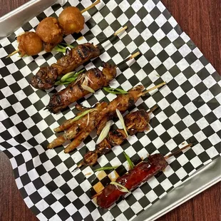 Skewers: Kwek-kwek, pork, chicken, chicken feet, pig intestines, hot dog | $2 each