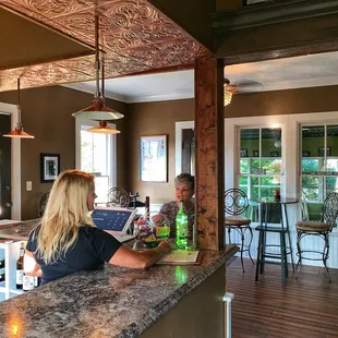 Entryway with parlor seating.