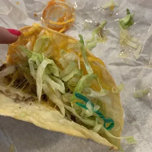 Shredded beef taco with an added twist tie