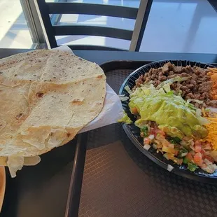 a tortilla and salad