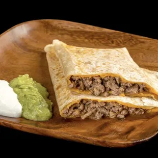 a burrito and guacamole