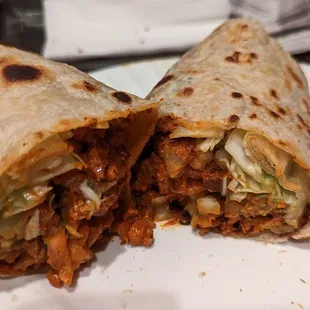 Super delish Adobada pork in mild hot red sauce, cabbage, tomatoes $10.07.  Add fresh Lemon = Max flavor profile ;D  4-1-2023