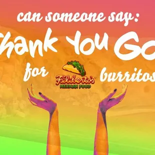 two hands holding a hot dog