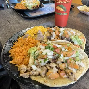 Chicken asada and carne asada tacos plate