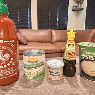 L to R: "Real" Sriracha, pandan condensed milk, wasabi powder, calamansi, corn in coconut milk dessert