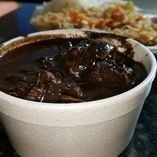 a bowl of beef and rice