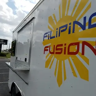a food truck parked in a parking lot