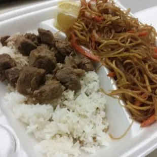 rice, beef and vegetables in a styrofoam container