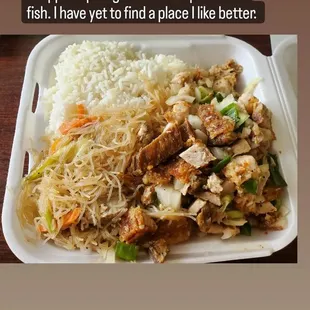 a plate of food with rice and meat