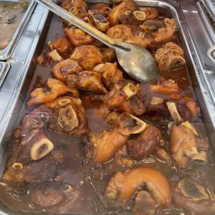 a pan of food with a spoon in it