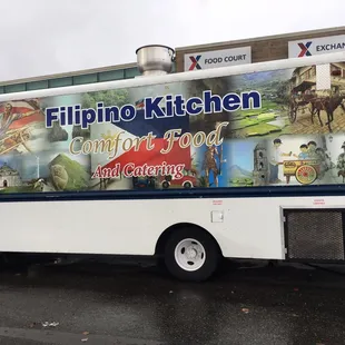 a food truck parked in front of a building