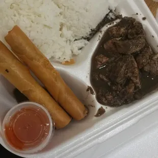 Boy #2&apos;s meal - Dinuguan and lumpia