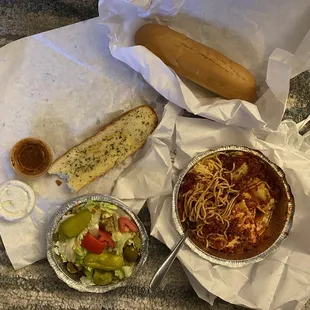 Filippi&apos;s Family Dinner Combo- Doordash. Garlic bread. Bread loaf. Salad. Vinaigrette and Ranch. Spaghetti/ravioli/lasagna