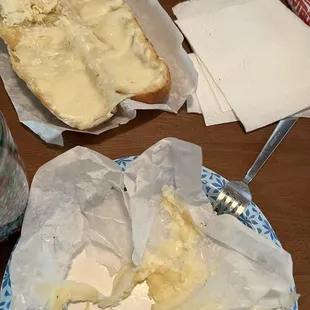 Cheese bread lost in its battle with the wax paper!