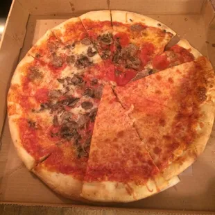 a whole pizza in a box