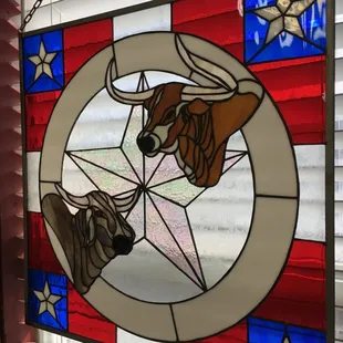 Unfortunately the staff did not know who the Stainglass Artist was.