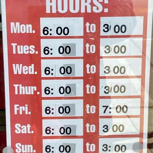 a business hours sign