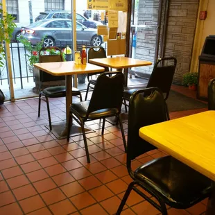 ows tables and chairs in a restaurant