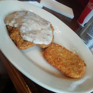 Chicken fried steak plate with hash browns instead of fries.