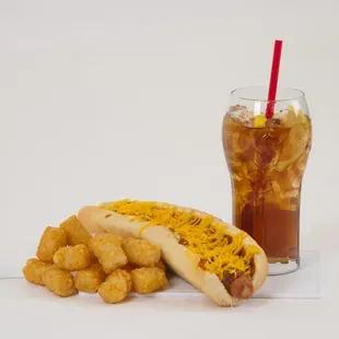 Foot long hotdogs and tator tots are a match made in heaven! Add cheese and onion and be in coney paradise!