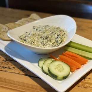 Spinach Artichoke Dip with House-Made Spinach Artichoke Dip, Served with Veggies and Crostini