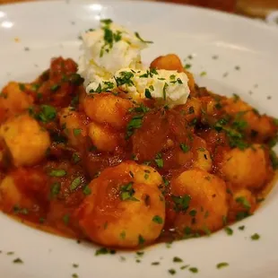 Gnocchi with their red meat sauce.