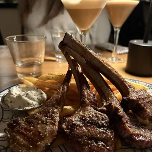 Lamb chops with espresso martinis in the background
