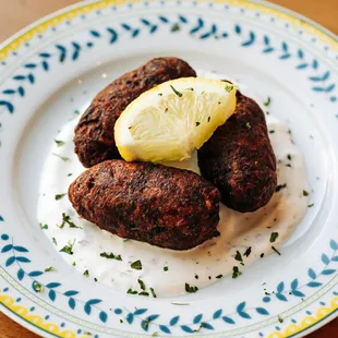 Keftedes (Cypriot Meatballs) on Yogurt-Mint Sauce