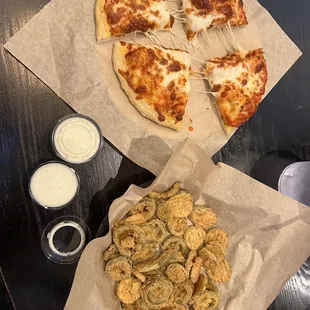 Kids pizza (came with a. Free drink too) and the fried pickles and jalapeños.
