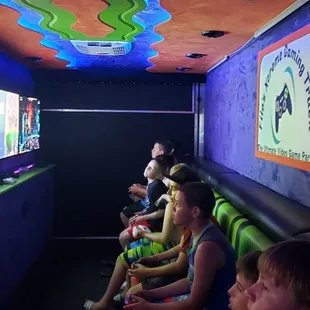 A happy party with a gaiming truck