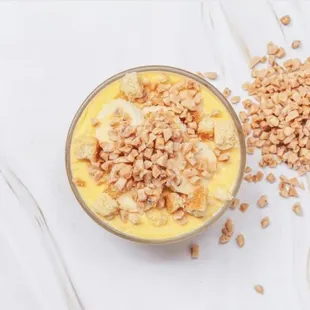 Toffee Banana Pudding:  Rich, creamy, thick vanilla pudding w./bananas, crunchy toffee and butter cookies. Buttery nutty bits in every bite!