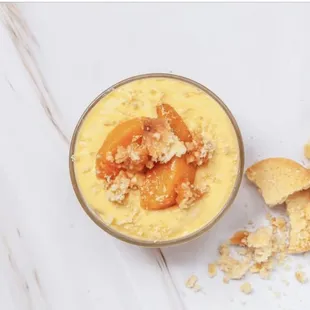 Peach Cobbler Banana Pudding: Rich,creamy, thick vanilla pudding w./bananas,peach cobbler (a-whole-nother dessert) and shortbread cookies.