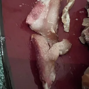 Raw bacon that I had to take out of the burger because there was no way I was eating it