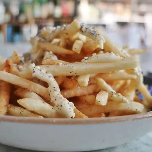 Perfectly crispy fries, topped with kewpie mayo and furikake seasoning