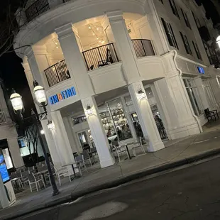 the outside of a building at night