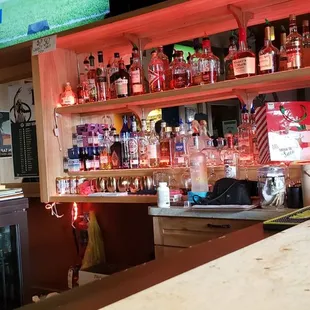 a bar with a lot of bottles