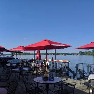 bles and umbrellas on a dock