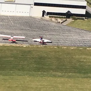 Fly in for a quick and tasty meal. The restaurant is where the tinted windows are.